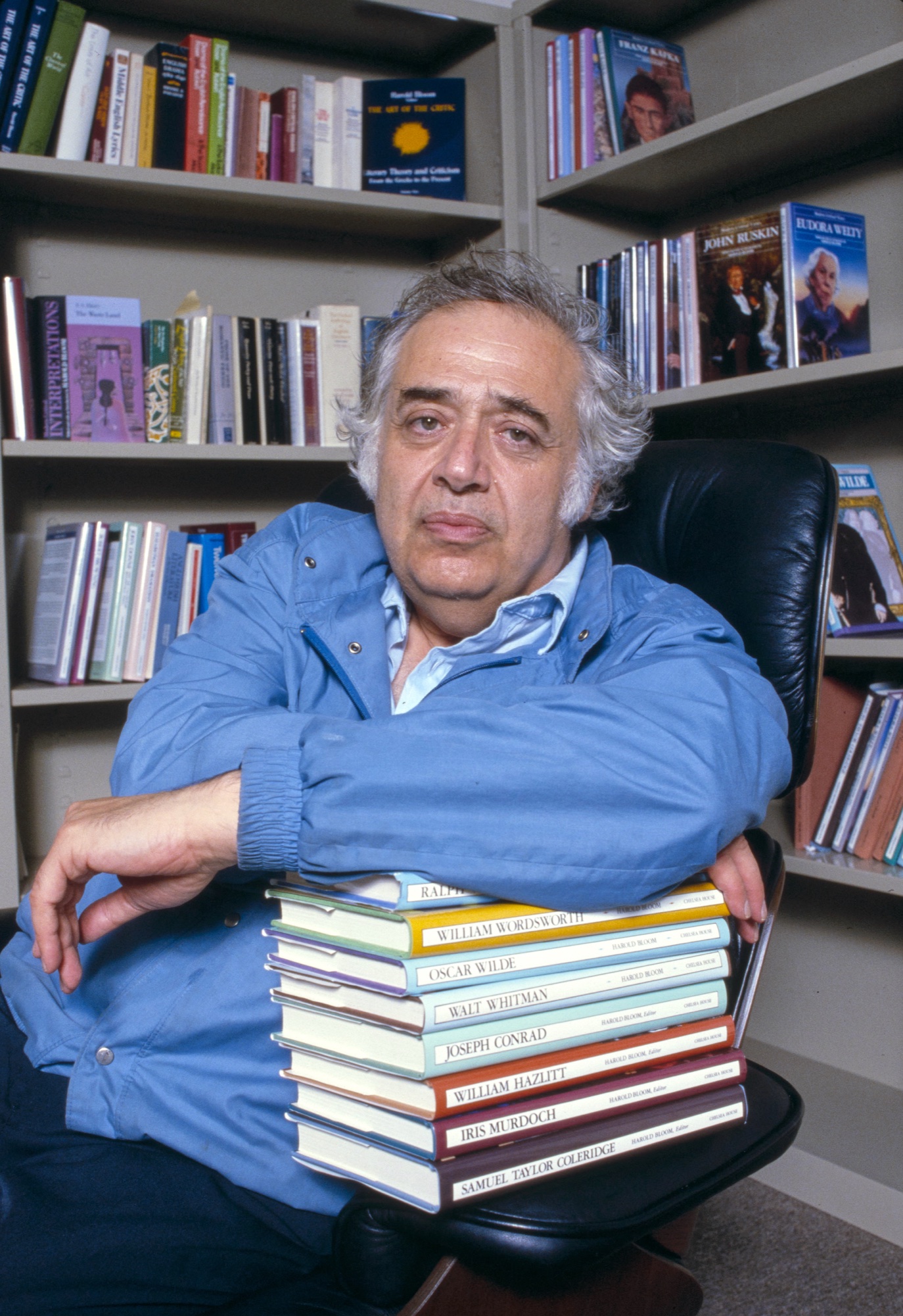 Harold Bloom in 1986 with a stack of books